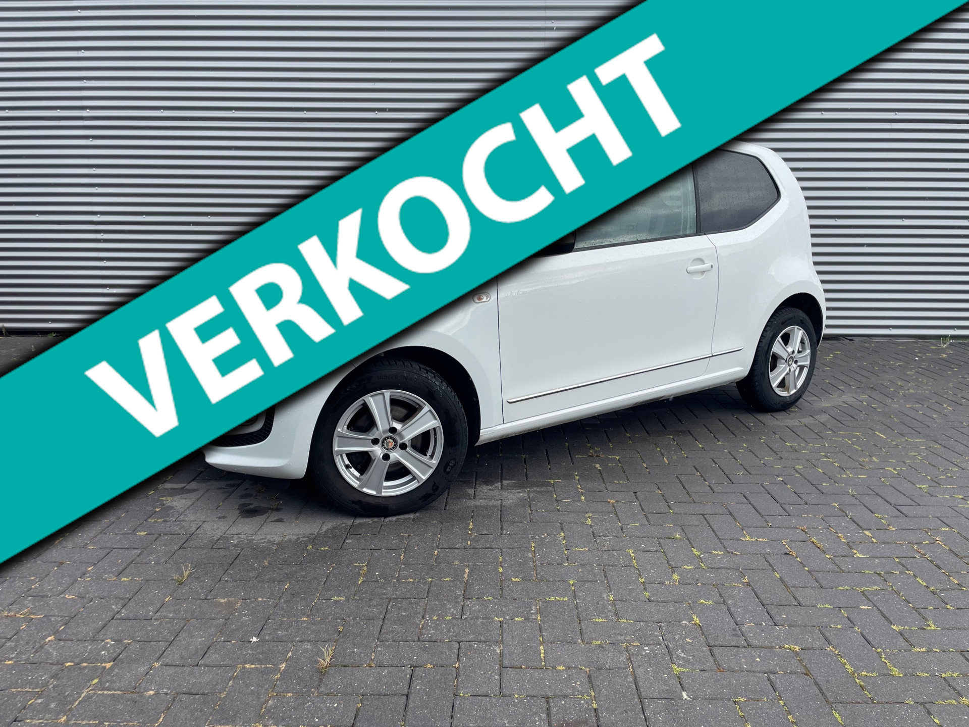 Volkswagen up! 1.0 white up met airco / cruise / navi / lmv