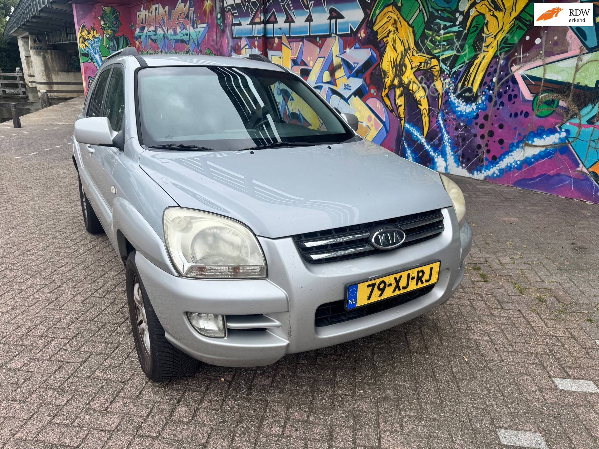 Kia Sportage 2.0 CVVT X-pression leer airco elektrische ramen sport velgen apk verlopen zo mee export prijs koopje