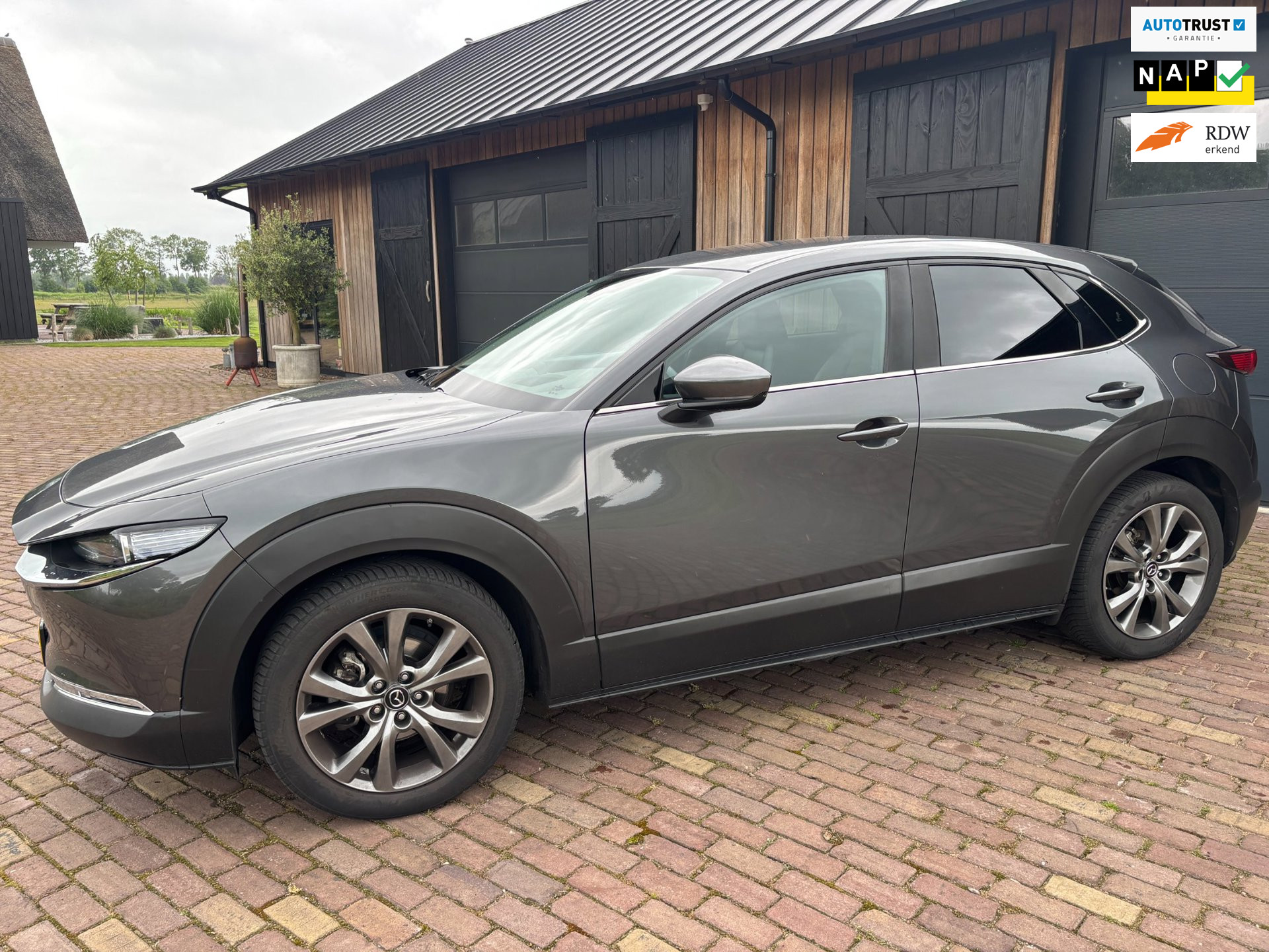 Mazda CX-30 2.0 e-SkyActiv-X M Hybrid Luxury ,CAMERA ,HUD,MEMORY STOELEN, TREKHAAK.