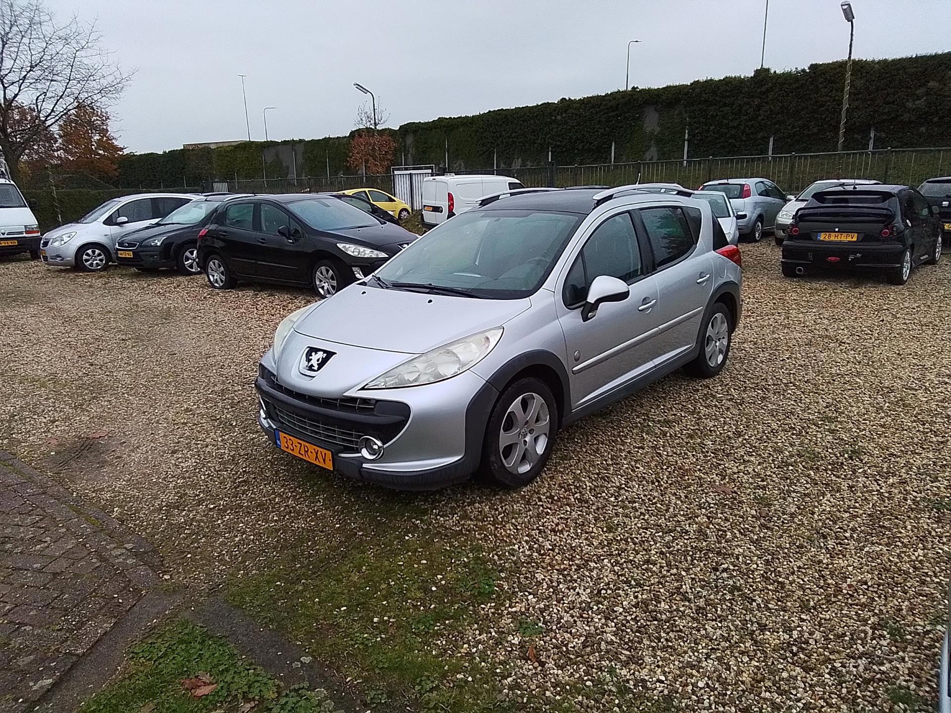 Peugeot 207 SW Outdoor 1.6 VTi XS zeer lux,s airco trekhaak paneramadak radio cd