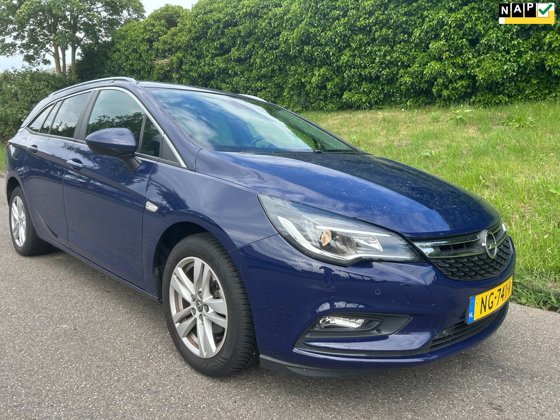 Opel Astra Sports Tourer 1.0 Business+ Navi – Airco – Cruise – PDC – Trekhaak