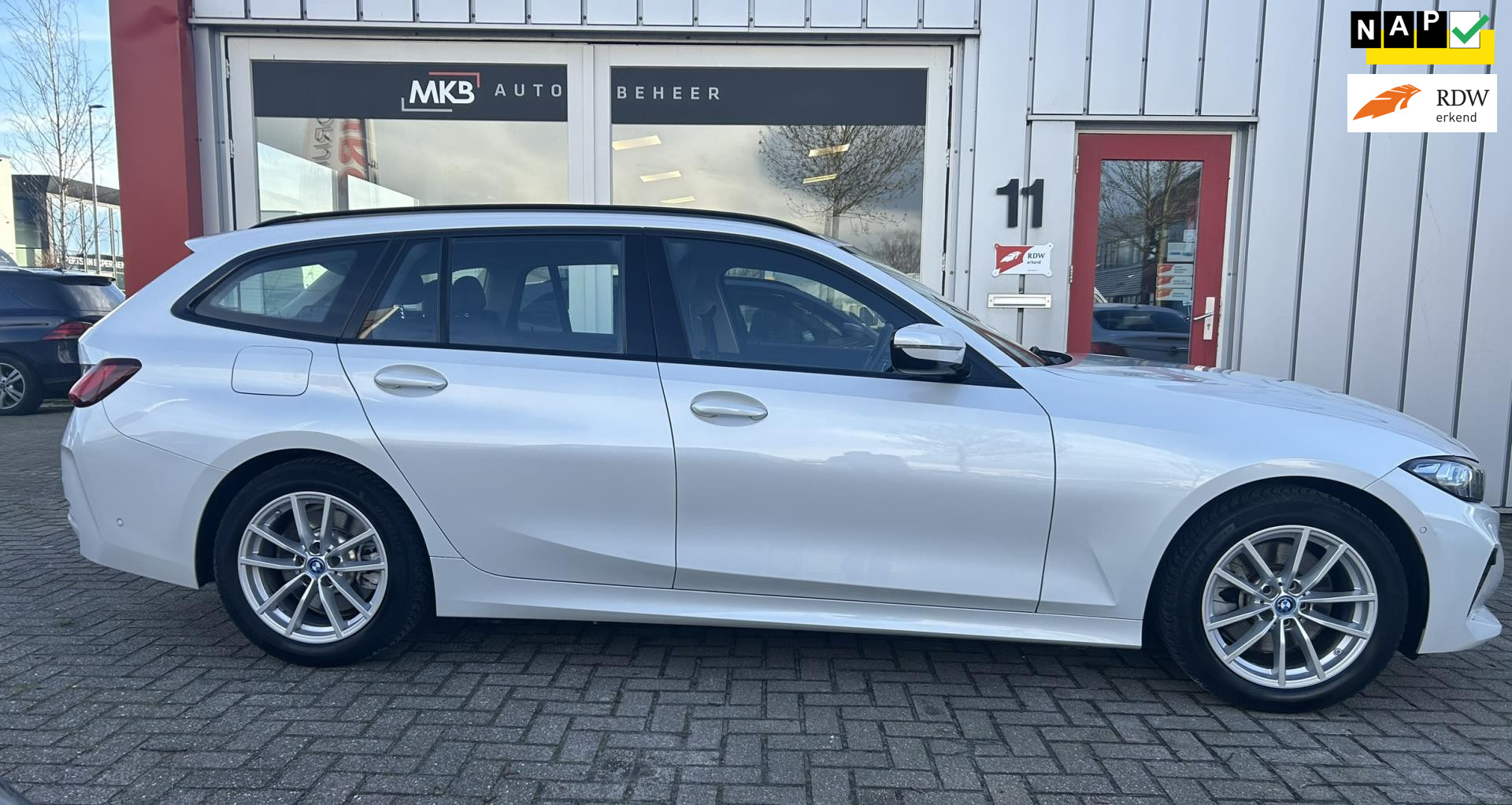 BMW 3 Serie Touring 320E WideScreen/Leer/LED