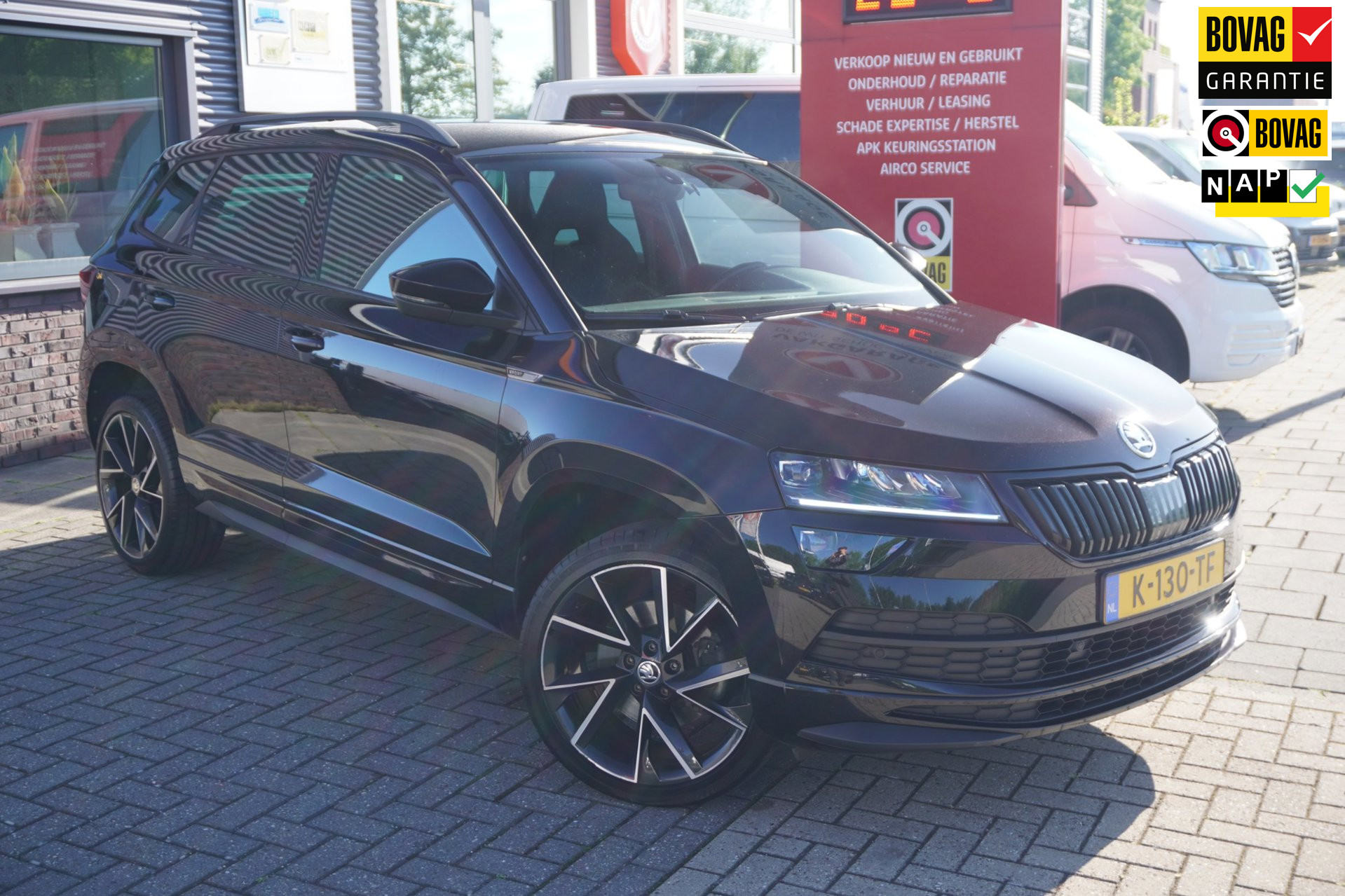 Škoda Karoq 1.5 TSI ACT Sportline Business / Stoel en stuurverwarming / Cruise / Carplay / Camera
