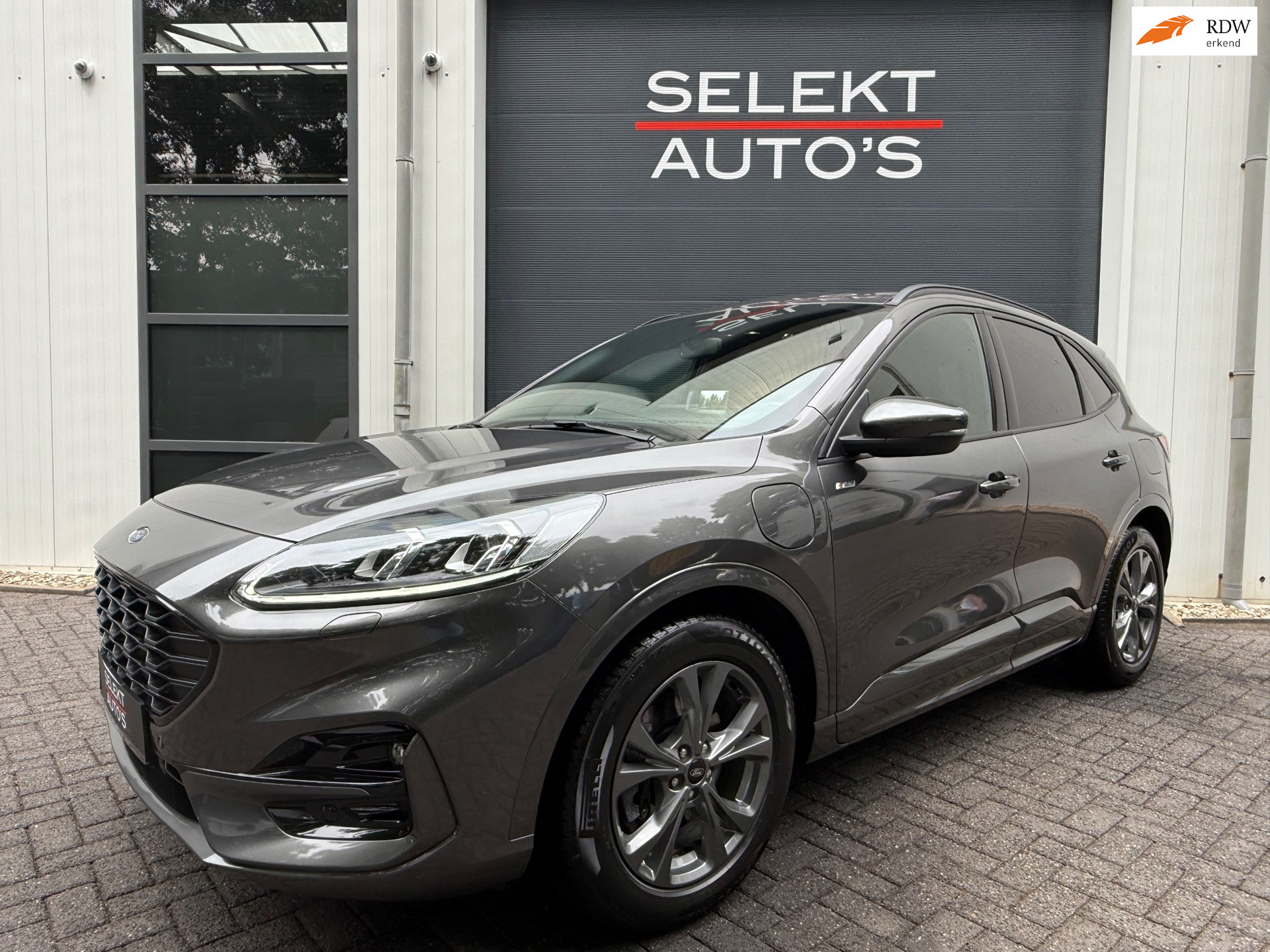 Ford Kuga 2.5 PHEV ST-Line X 224 Pk Cruise/Climate/Leder/Alcantara/Car Play/B&O/Head Up/Navigatie/PDC/Winter Pack/LED/Apk 07-2027