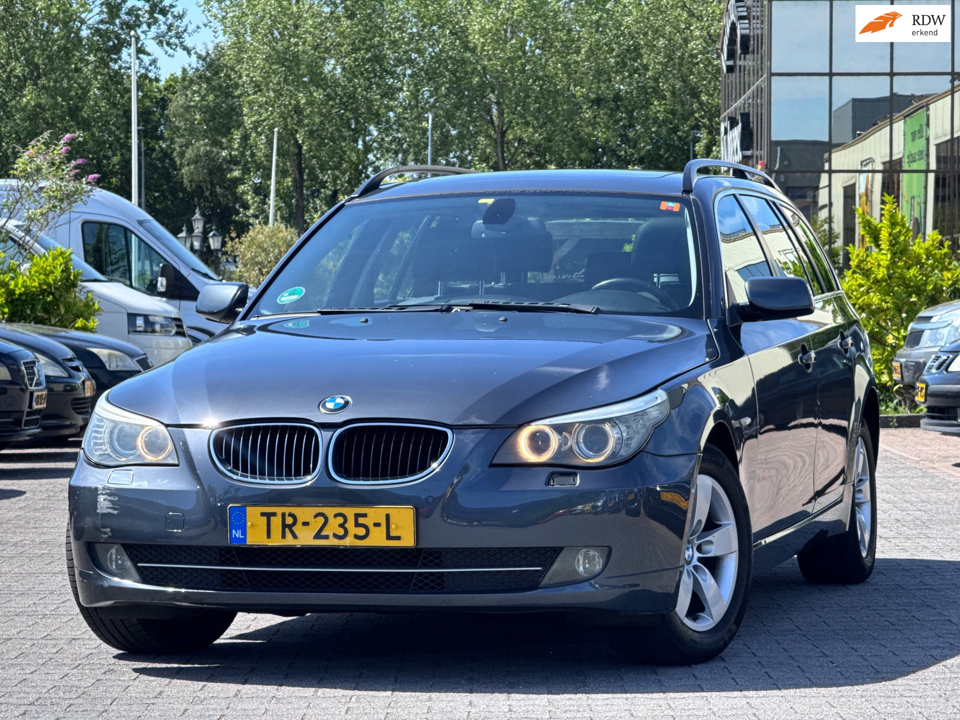 BMW 5 Serie Touring 523i High Executive | APK 11-04-2027 | Panoramadak | Leder elektrische stoelen | Xenon | Bluethooth |