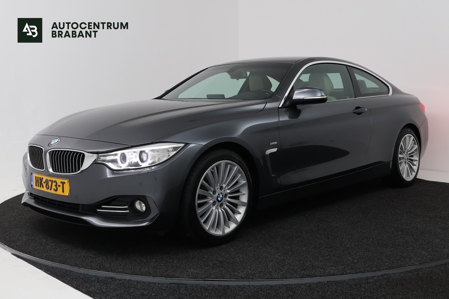 BMW 4 Serie Coupé 420i Luxury (GROOT-NAVIGATIE, SPORTSTOELEN, STOELVERWARMING, PDC, DEALER ONDERHOUDEN)