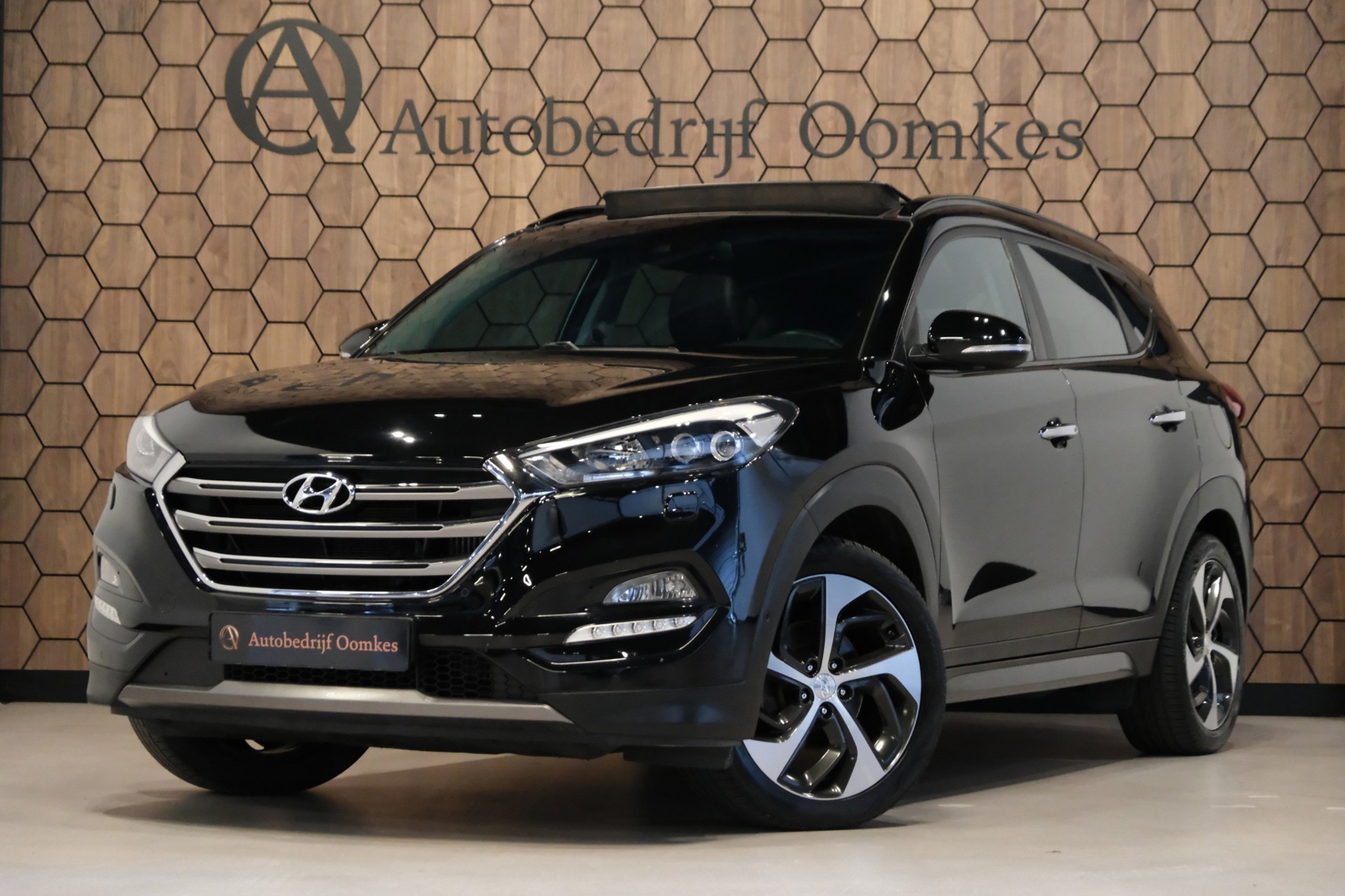 Hyundai Tucson 1.6 T-GDi 4WD *PANORAMADAK* Leder/Afn. Trekhaak/Navi/Camera/ALL-Seasons