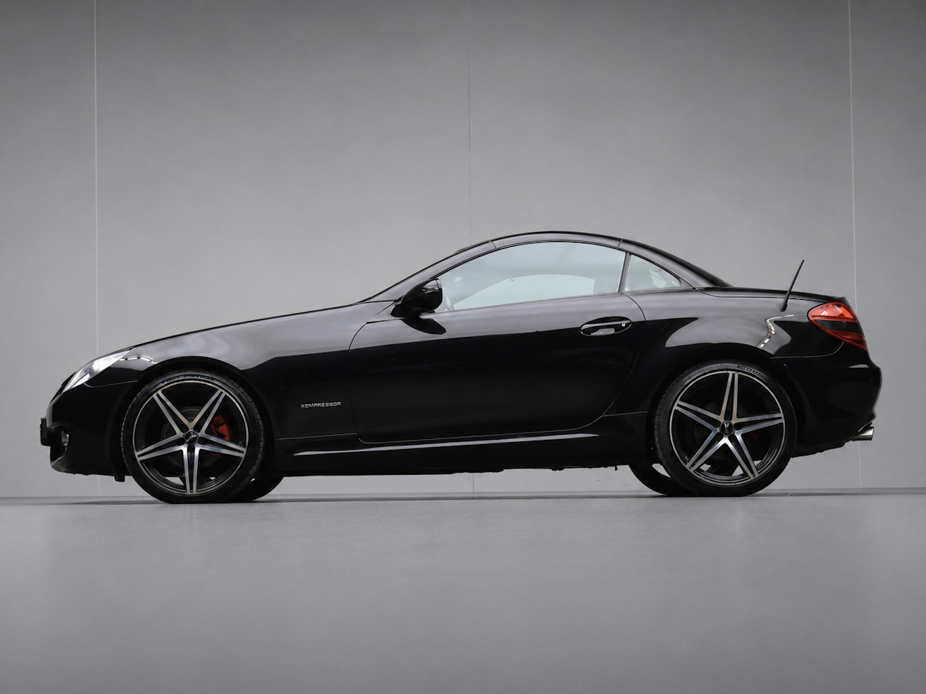 Mercedes-Benz SLK 200 K. Prestige Plus Sport Cabrio (NAVI,STOELVERWARMING,PDC,CLIMATE,CRUISE,LEDER,SPORTSTOELEN,LM VELGEN)