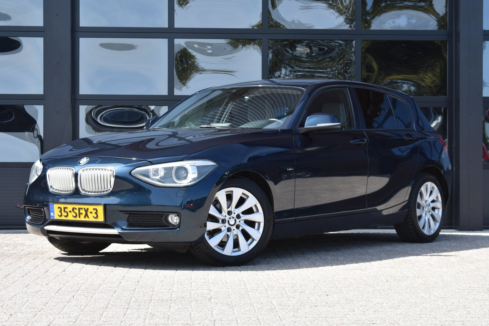 BMW 1-serie 116i Business ’11 Navi Clima Cruise