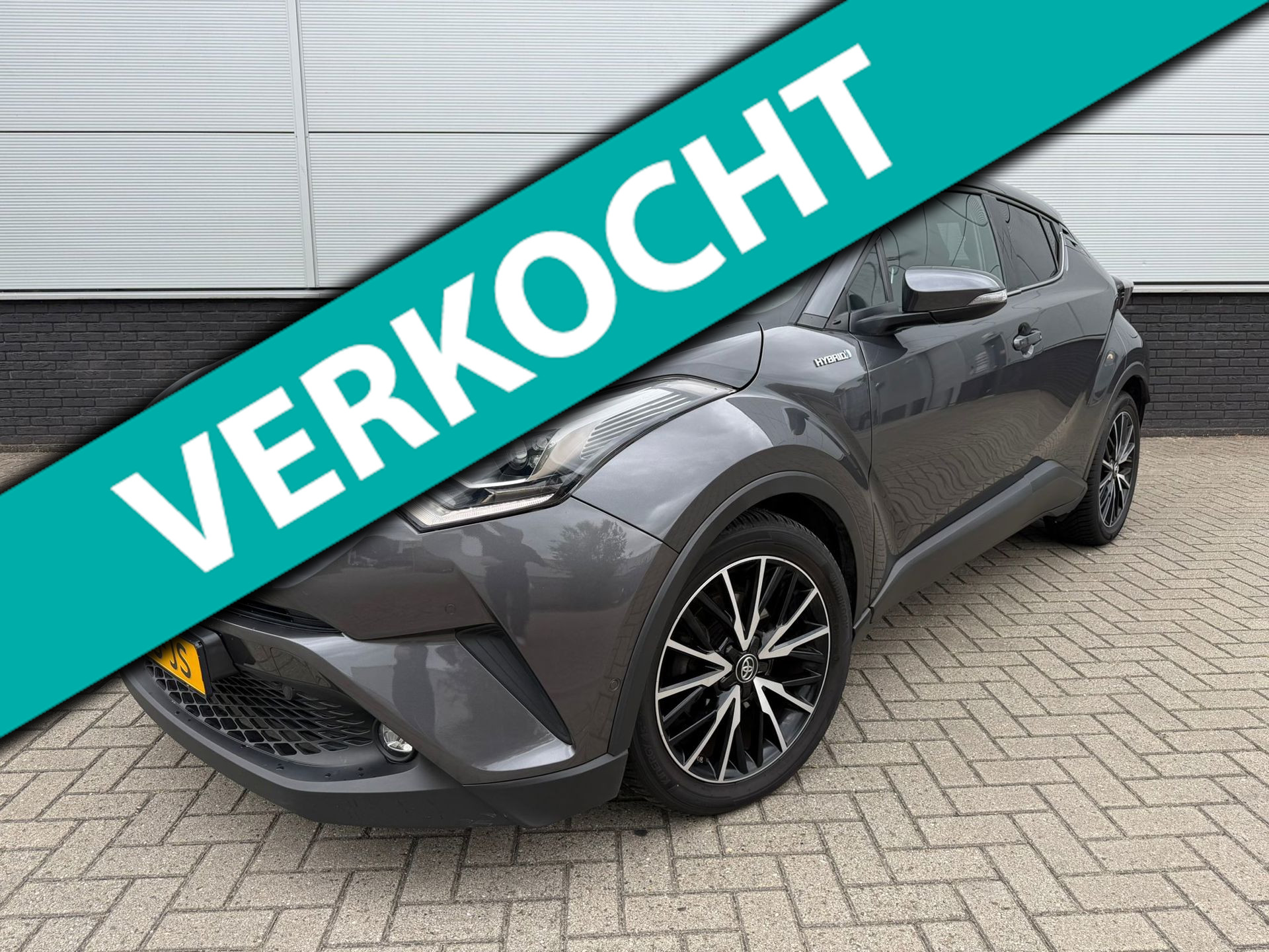 Toyota C-HR 1.8 Hybrid Bi-Tone clima – full map navi – trekhaak – half leder – JBL – privacy glass – camera – sensoren