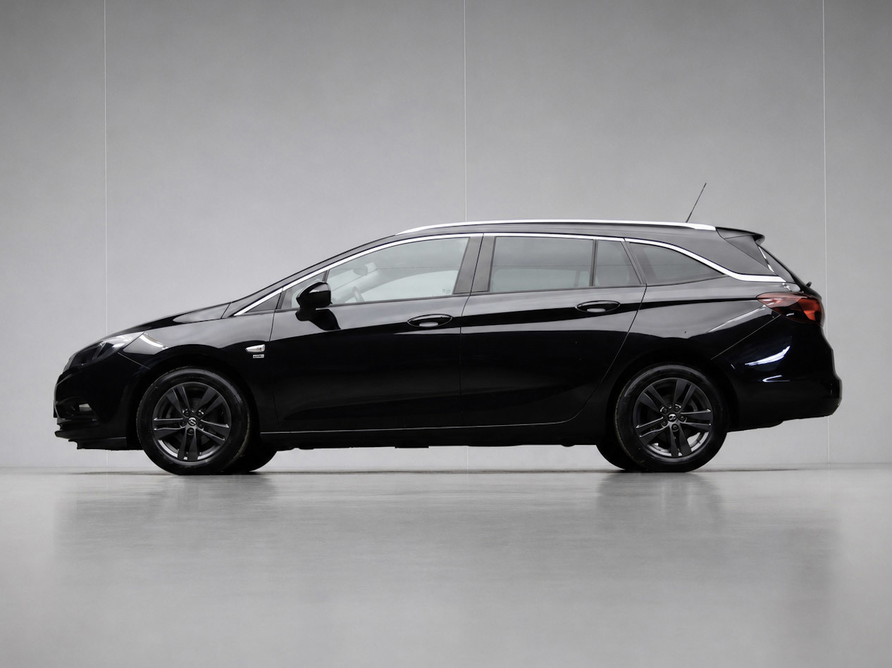 Opel Astra Sports Tourer 1.0 Turbo 120 Jaar Edition Sport (APPLE CARPLAY,NAVI,PDC,CLIMATE,CRUISE,GETINT,SPORTSTOELEN,LM VELGEN)