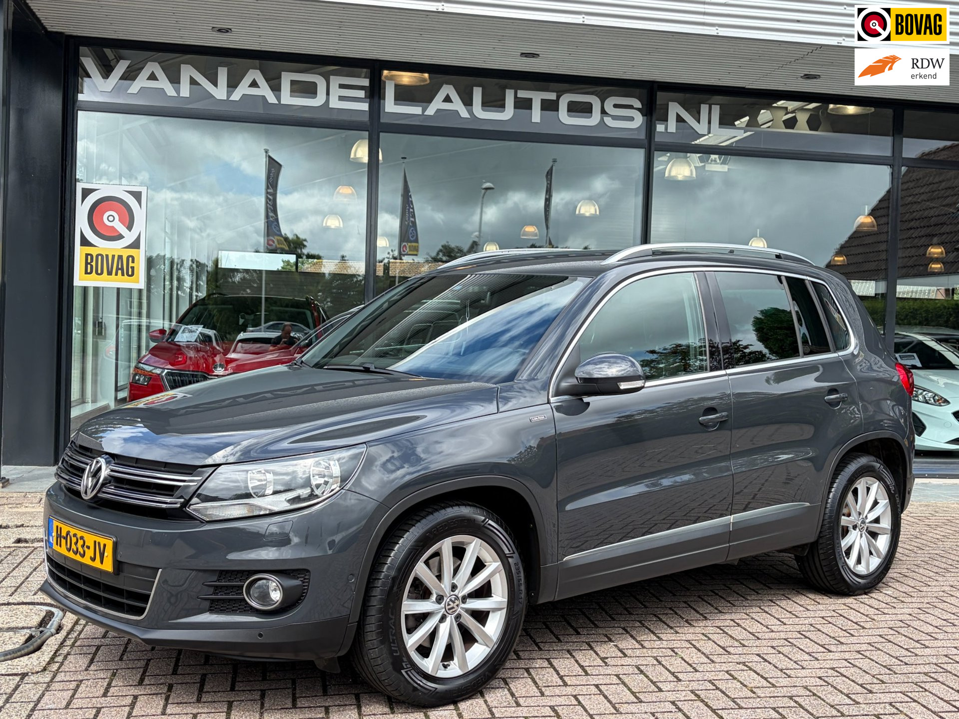 Volkswagen Tiguan 1.4 TSI R-Line Navi Camera Clima Cruise Trekhaak Volledig Dealeronderhouden!