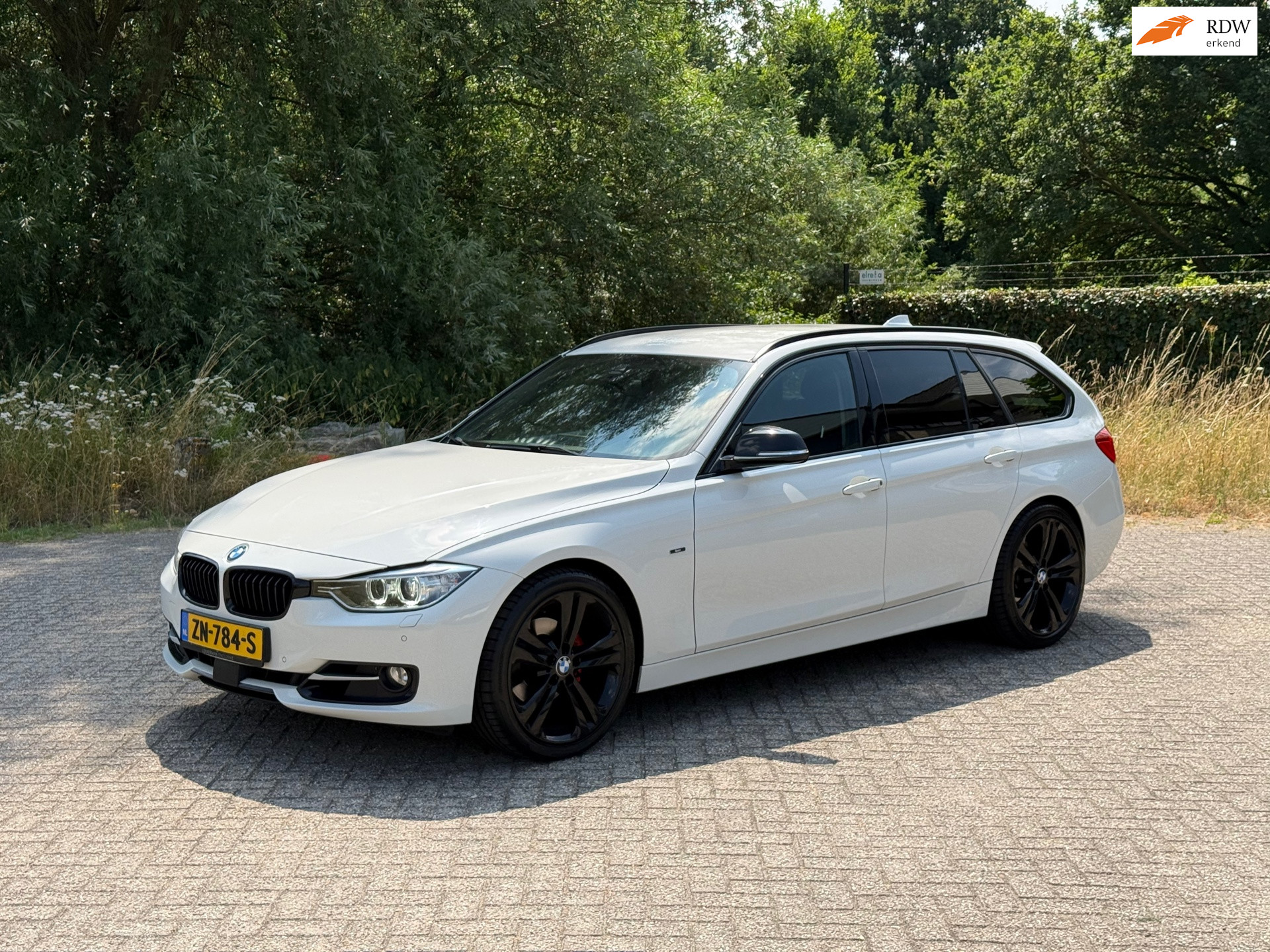 BMW 3 Serie Touring 320i High Executive AUTOMAAT I LED I NAVI I VOLL ONDERHOUD