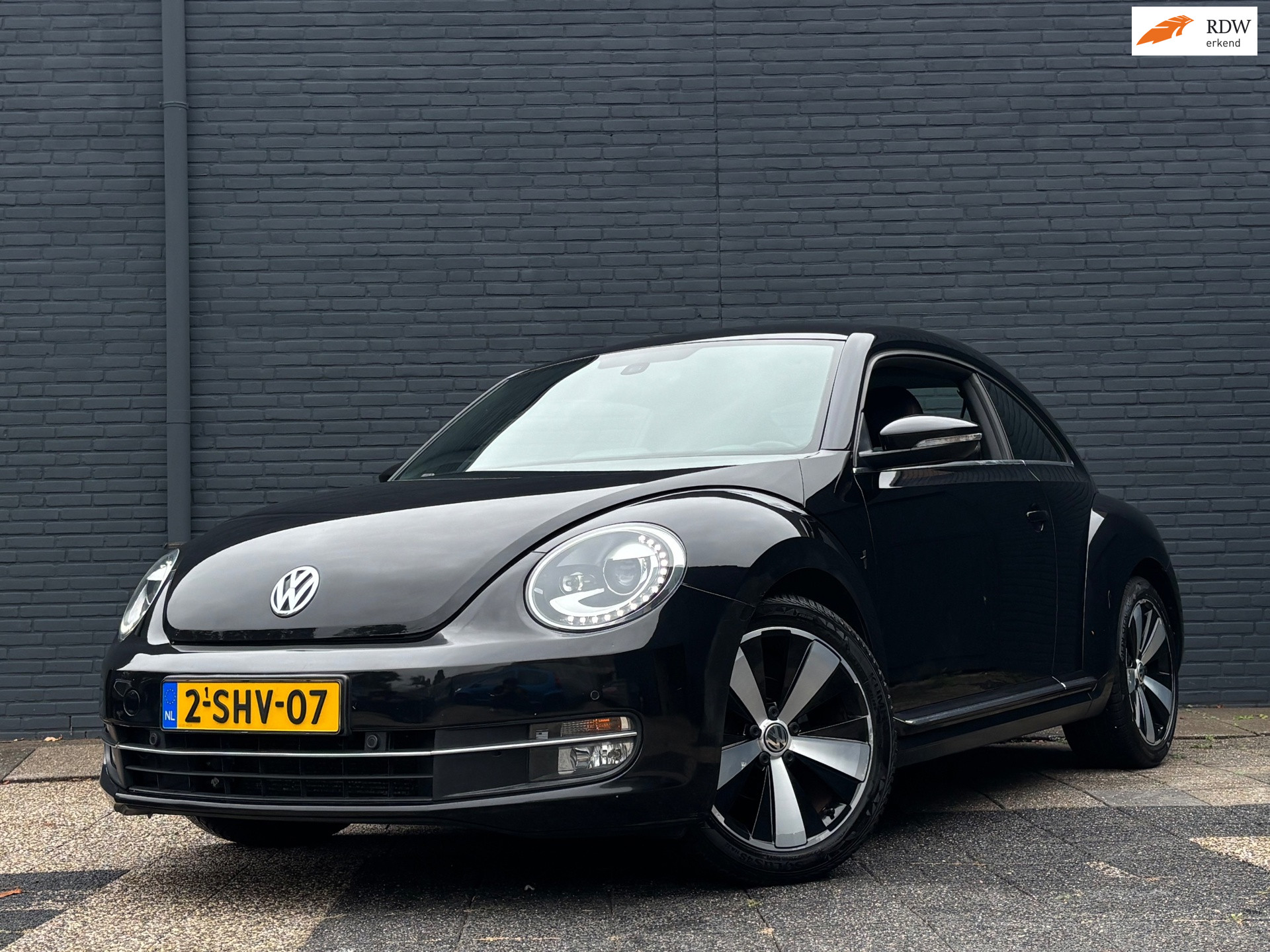 Volkswagen Beetle 1.2 TSI Design | Leder | Stoelverwarming | Fender